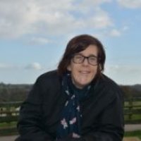 woman behind blue sky