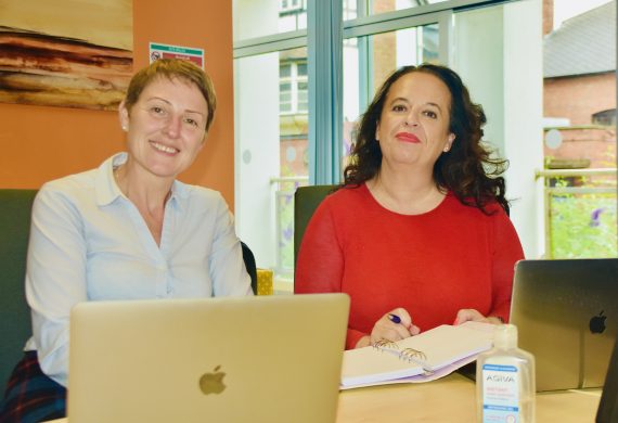 two women smiling